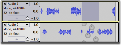 The two sync-locked tracks from the previous image, after the silence operation, showing that audio was silenced in the upper track but nothing happened to the lower track.